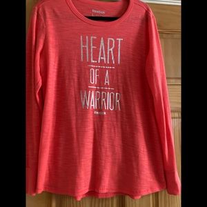 Woman’s Reebok heart of a warrior tee shirt